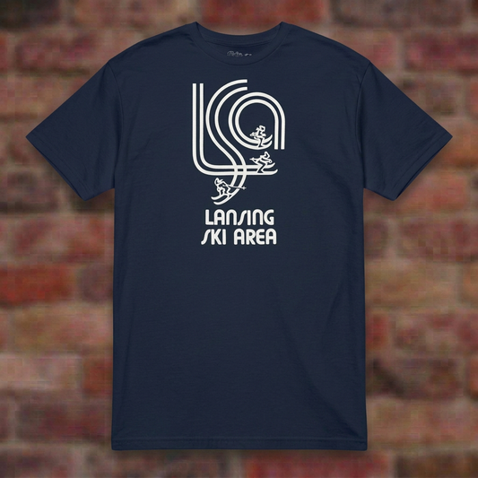 Lansing Ski Area Navy T-shirt flat lay on brick background
