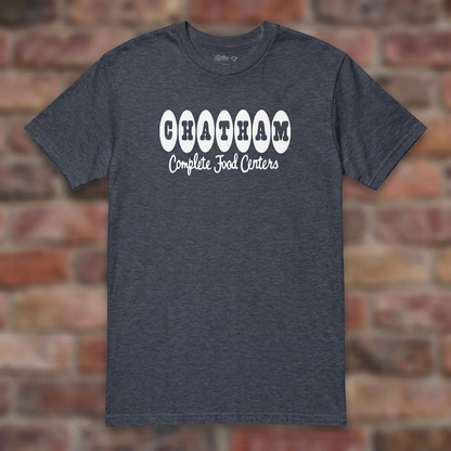 Chatham Heather Navy T-shirt flat lay on brick background