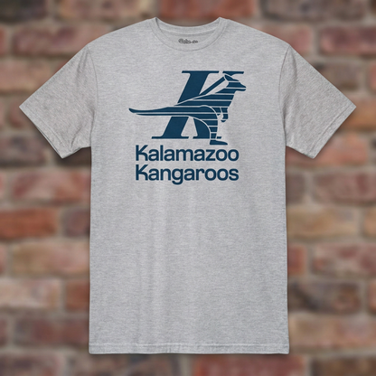 Kalamazoo Kangaroos Sport Grey T-shirt flat lay on brick background