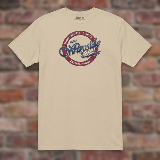 Wayside West Sand T-shirt flat lay on brick background