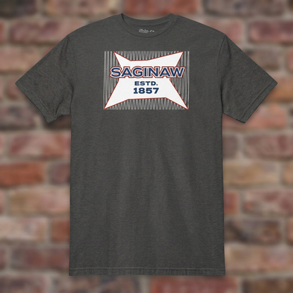 Saginaw Bread Bag Dark Heather Grey T-shirt flat lay on brick background