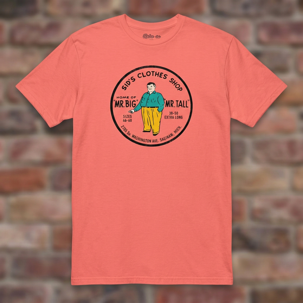 Sid's Clothing Shop Saginaw T-shirt in Coral Silk, flat lay on warm brick background