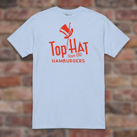 Top Hat Hamburgers Light Blue T-shirt flat lay on brick background