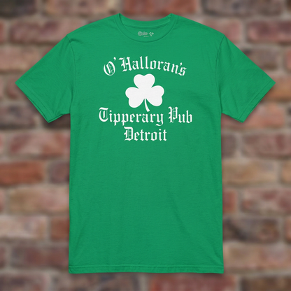O'Hallorans Tipperary Pub Detroit Irish Green T-shirt flat lay on weathered brick background