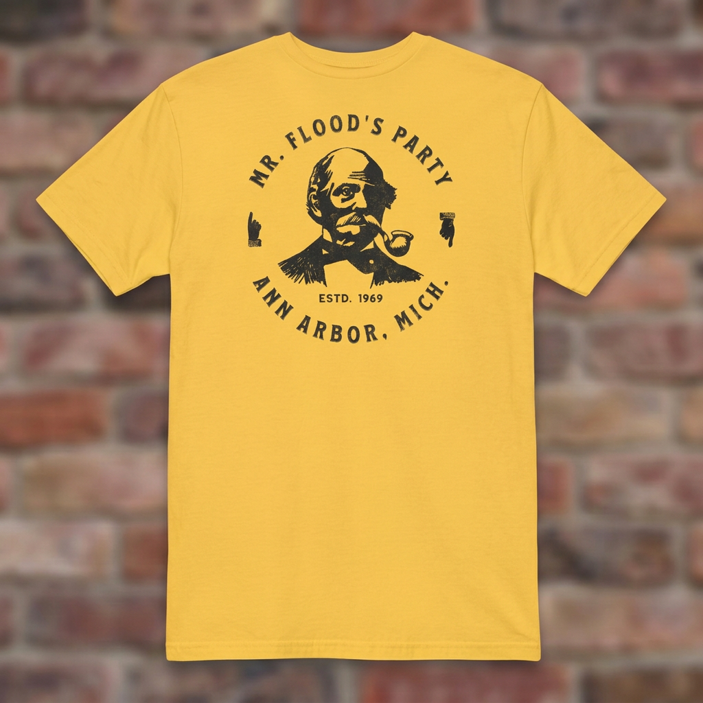 Mr. Flood's Party Daisy T-shirt flat lay on warm brick