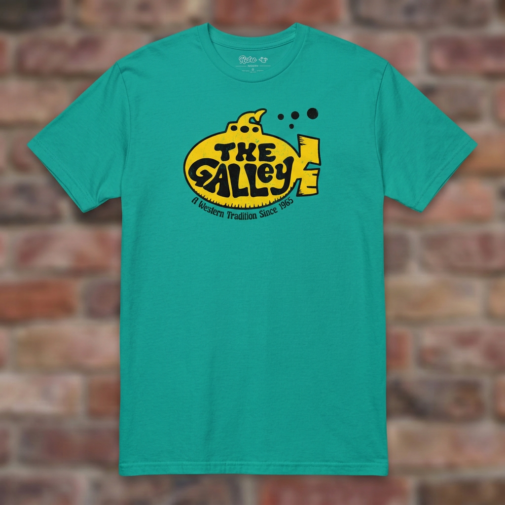 The Galley Jade Dome T-shirt flat lay on warm brick