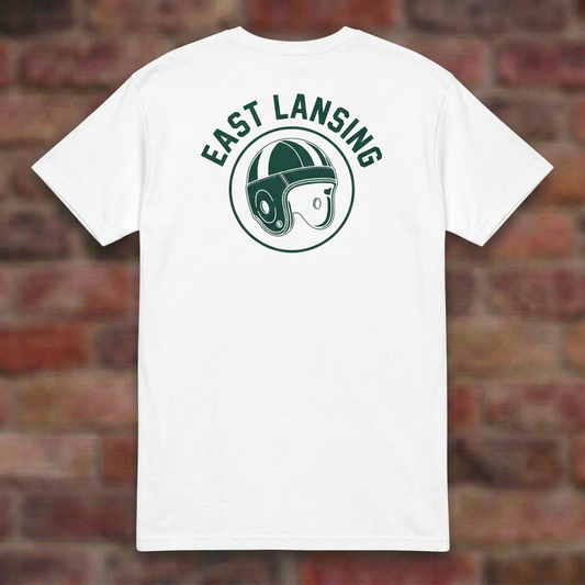 East Lansing Old School Football White T-shirt flat lay on brick background