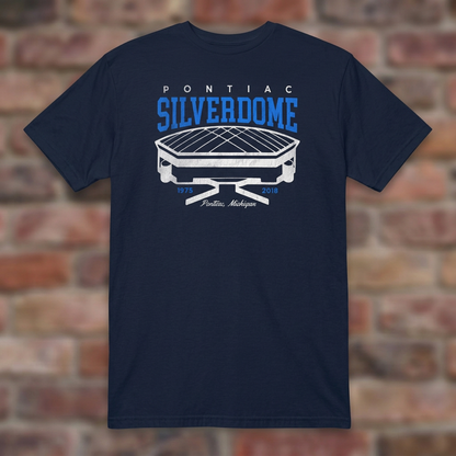 Pontiac Silverdome Navy T-shirt flat lay on brick background