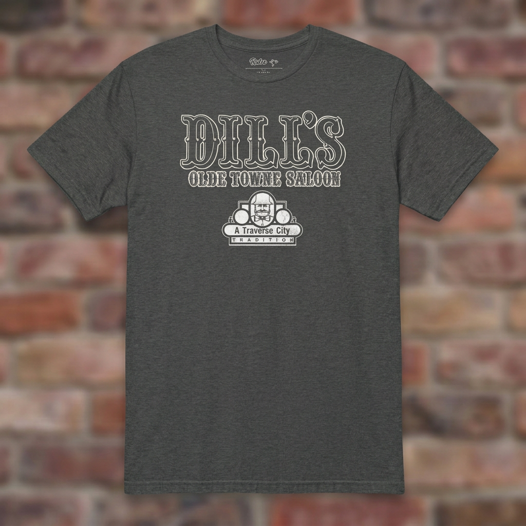 Dill’s Olde Towne Saloon Dark Heather Grey T-shirt flat lay on brick background