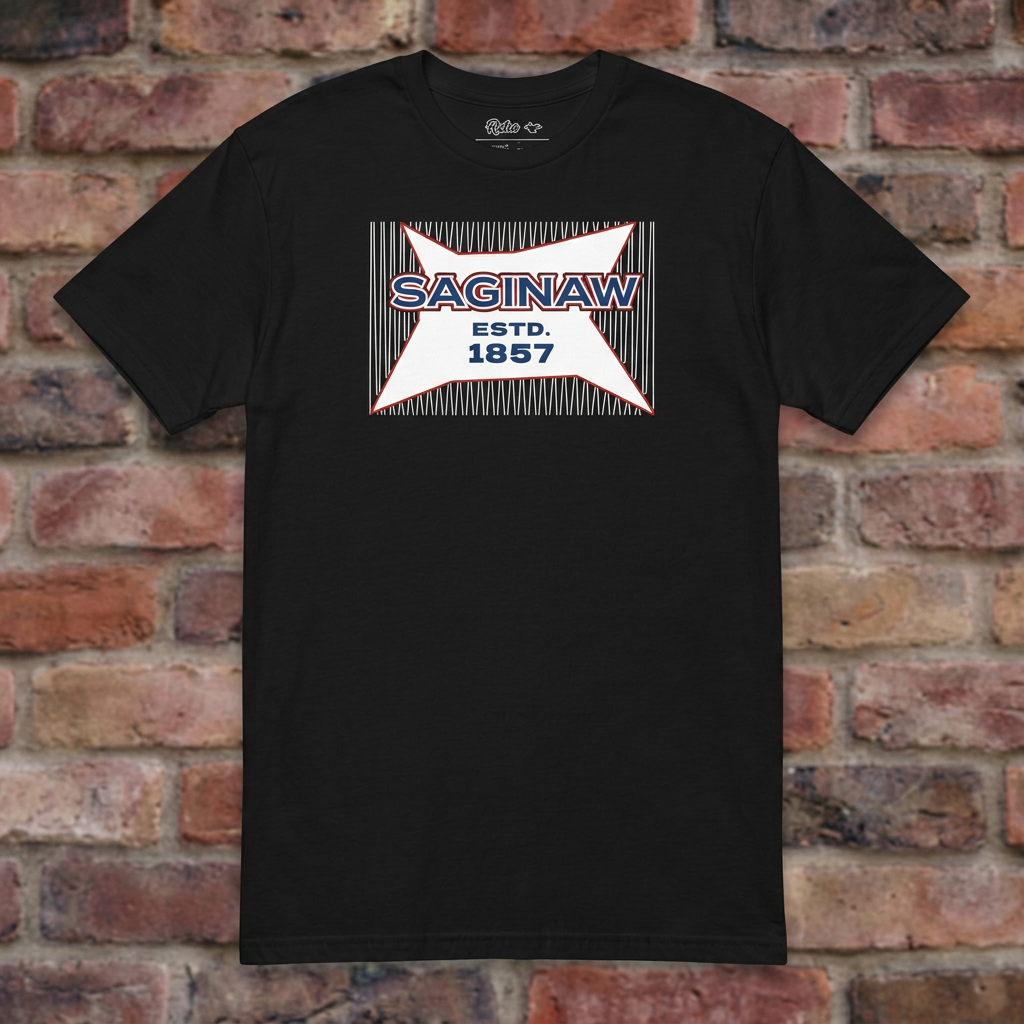 Saginaw Bread Bag Black T-shirt flat lay on brick background