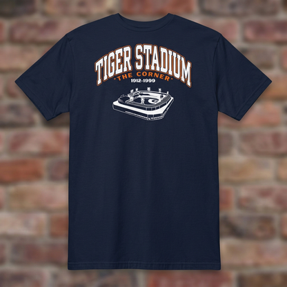 Navy Tiger Stadium 1912-1999 T-shirt flat-lay against weathered brick