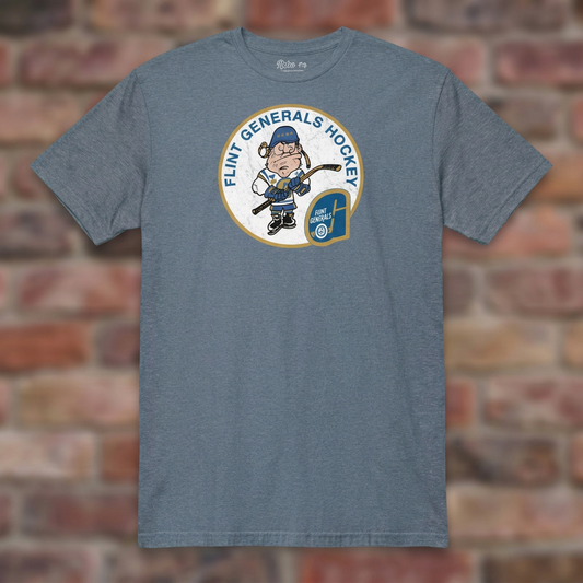 Flint Generals Hockey T-shirt in Heather Indigo, flat lay on warm brick background