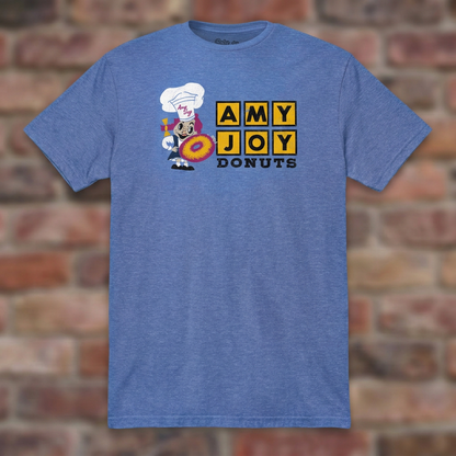 Amy Joy Donuts Heather Royal T-shirt flat lay on brick background