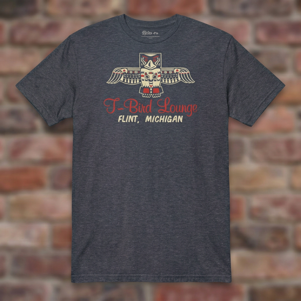 T-Bird Lounge Heather Navy T-shirt flat lay on brick background