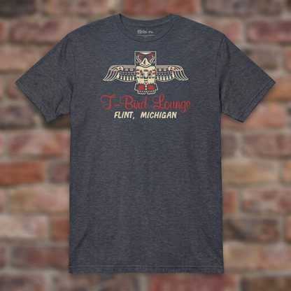 T-Bird Lounge Heather Navy T-shirt flat lay on brick background