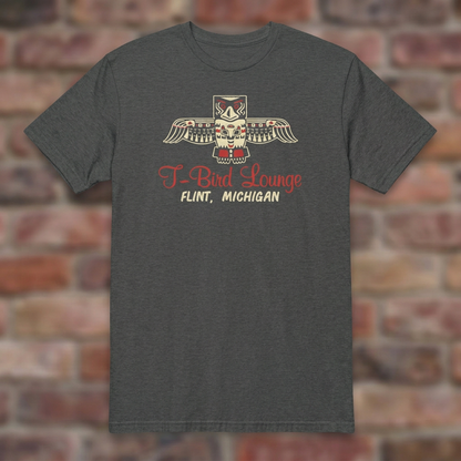T-Bird Lounge Dark Heather Grey T-shirt flat lay on brick background