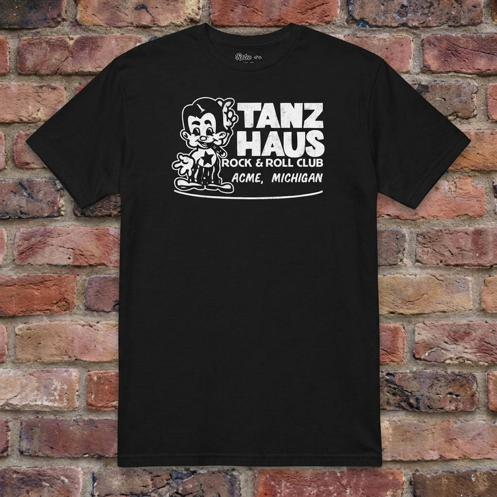 Tanz Haus Black T-shirt flat lay on warm brick