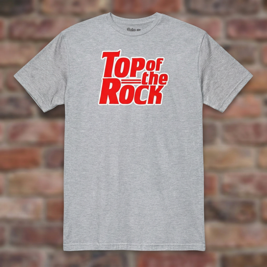 Top of the Rock Sport Grey T-shirt flat lay on brick background