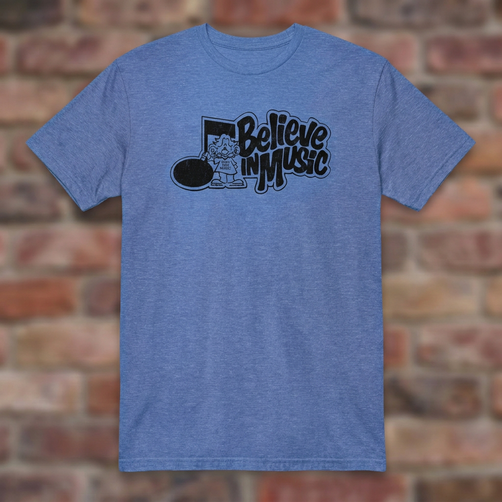 Heather Royal Believe in Music T-shirt flat-lay on weathered brick