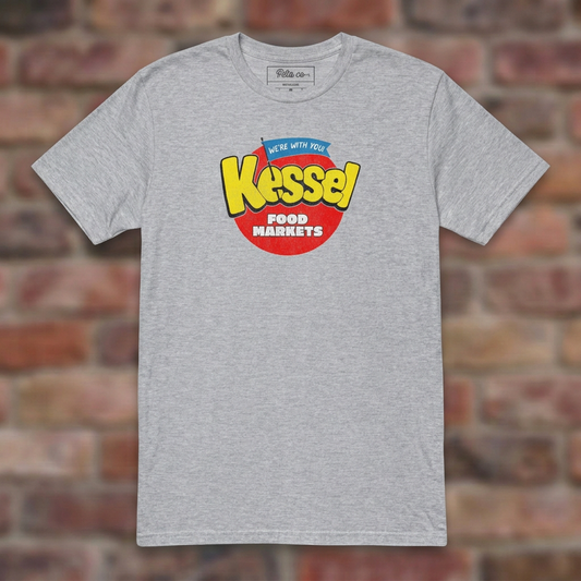 Kessel Sport Grey T-shirt flat lay on brick background