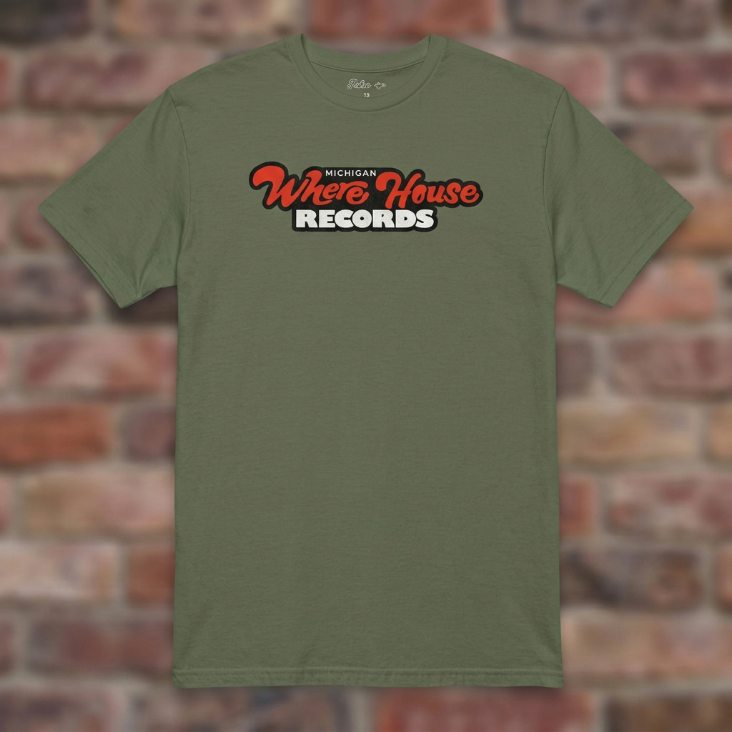 Wherehouse Records Michigan Military Green T-shirt flat lay on brick background