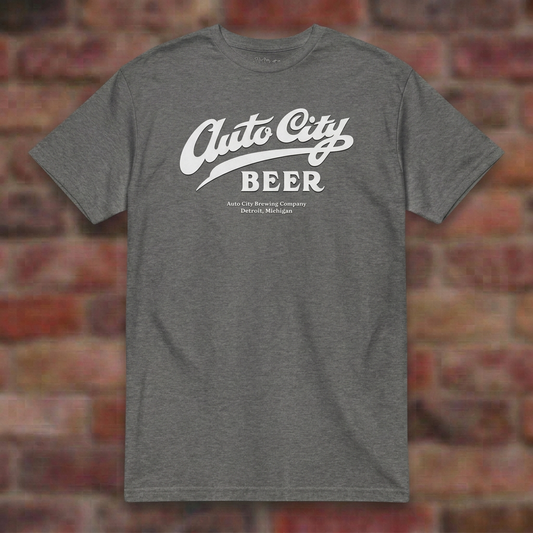 Auto City Beer Graphite Heather T-shirt flat lay on brick background