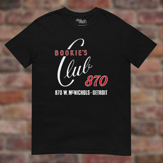 Bookie's Club 870 Detroit T-shirt in Black, flat lay on warm brick background