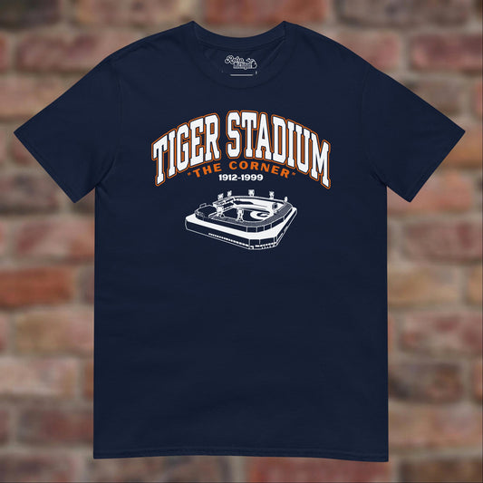 Navy Tiger Stadium 1912-1999 T-shirt flat-lay against weathered brick